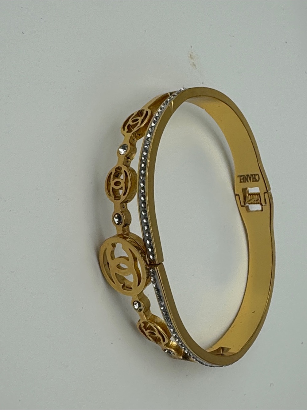 Gold Logo Cutout Crystal Accent Bangle Bracelet
